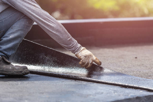 Professional Waterproofing technician working in Huron, IN
